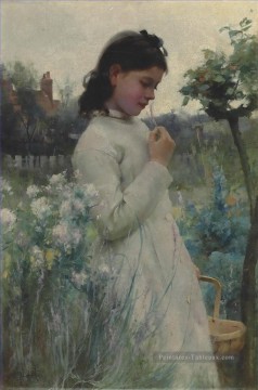 Une jeune fille dans un jardin Alfred Glendening JR Peinture à l'huile